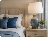 Blue lamp beside a bed